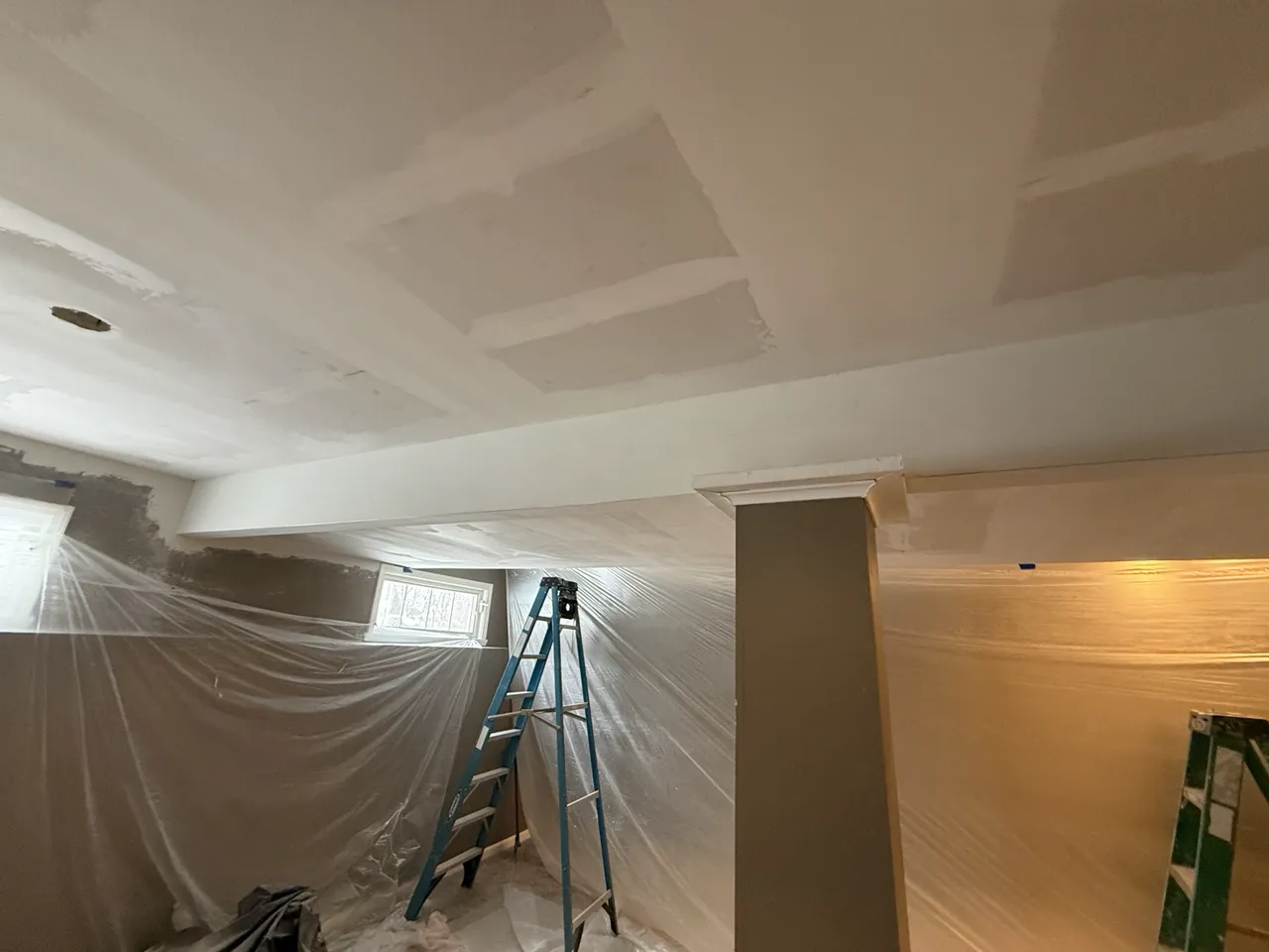 Interior room after drywall and ceiling repair work