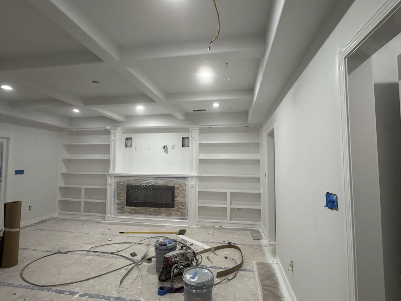 Interior room showing completed paint and trim work